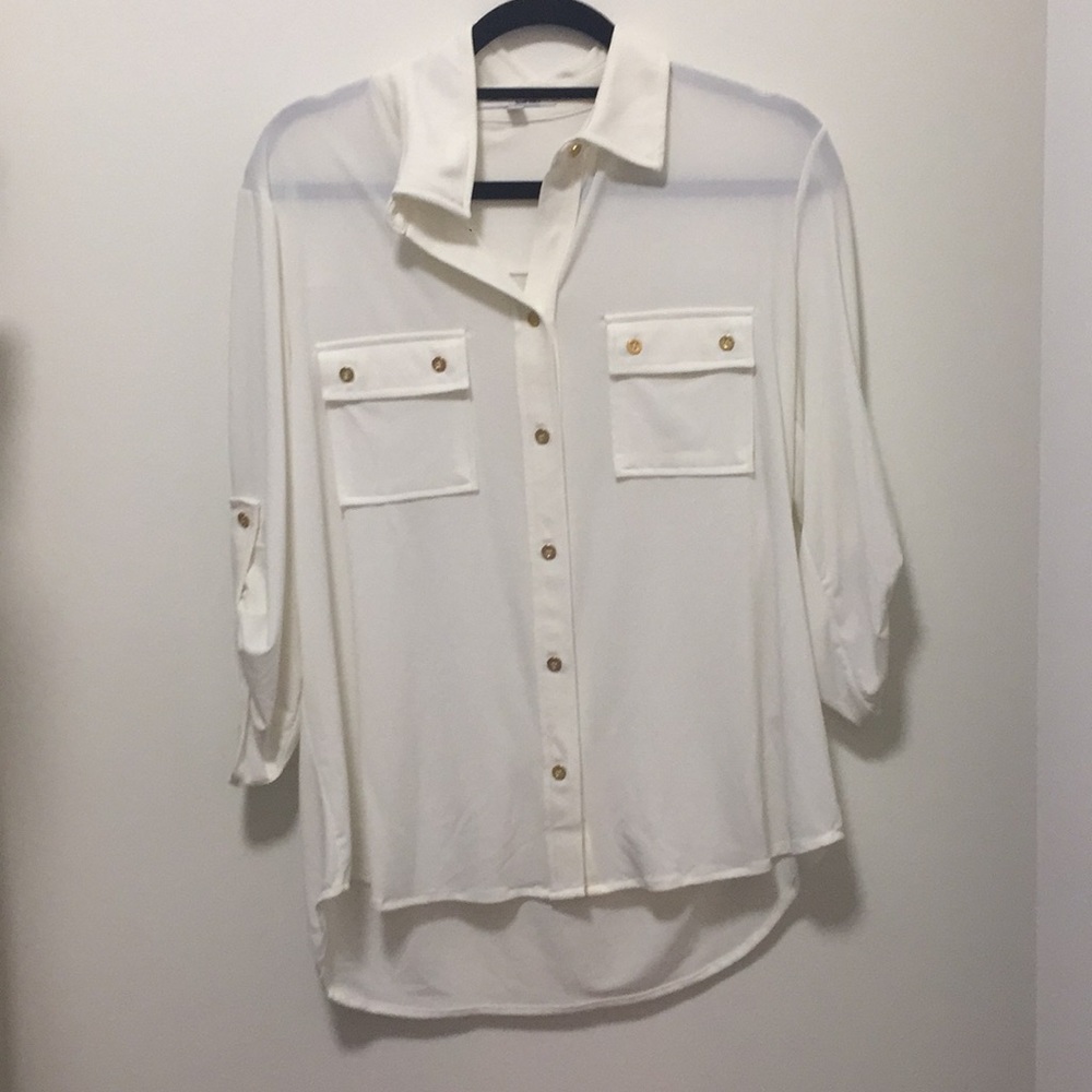 White flowy top with golden bottons